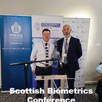 The Commissioner and Operations Manager in front of SBC Banner.