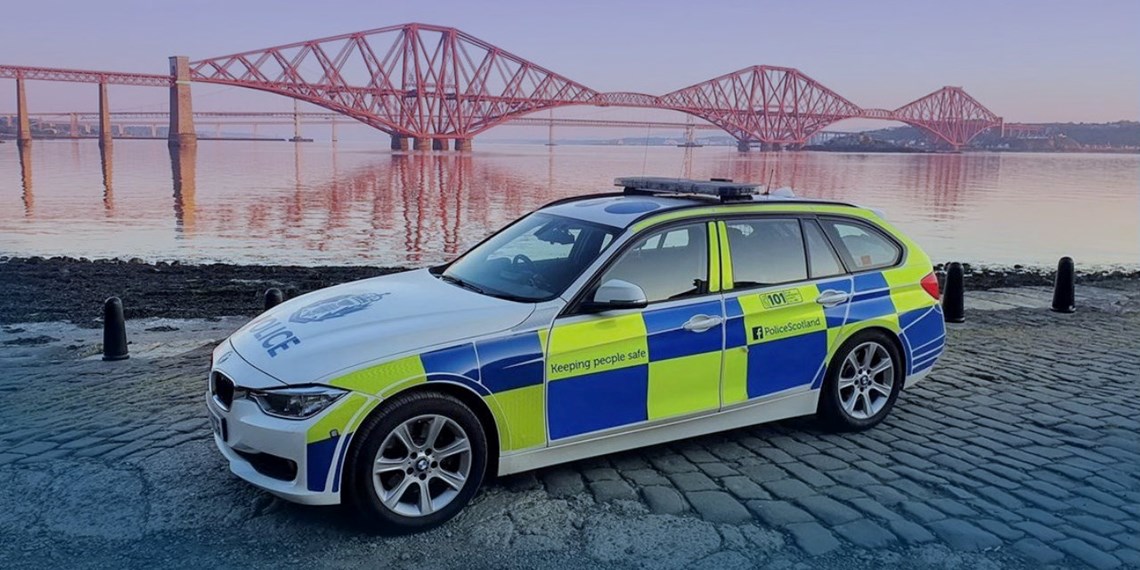 Police car with the Forth Rail Bridge in the background